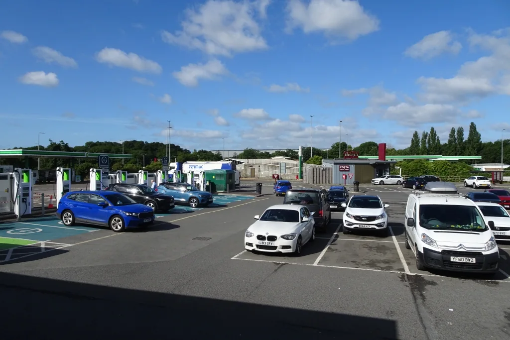 Electric vehicle charging bays at Watford Gap motorway services.